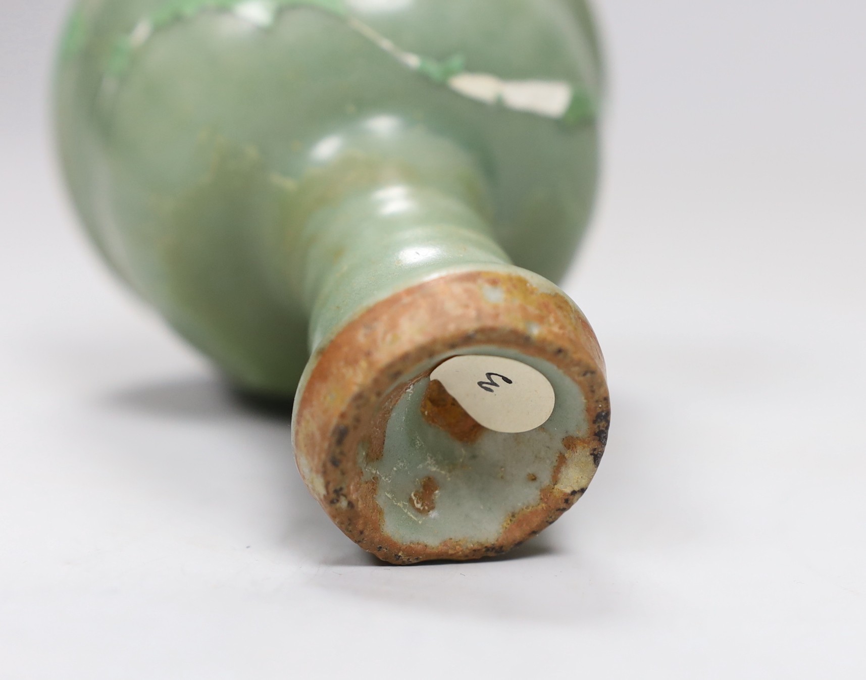 A Chinese Longquan celadon stem cup, Ming dynasty, 10cm, restored